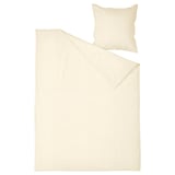 Cream cotton bed set - duvet, pillows, clean edges.