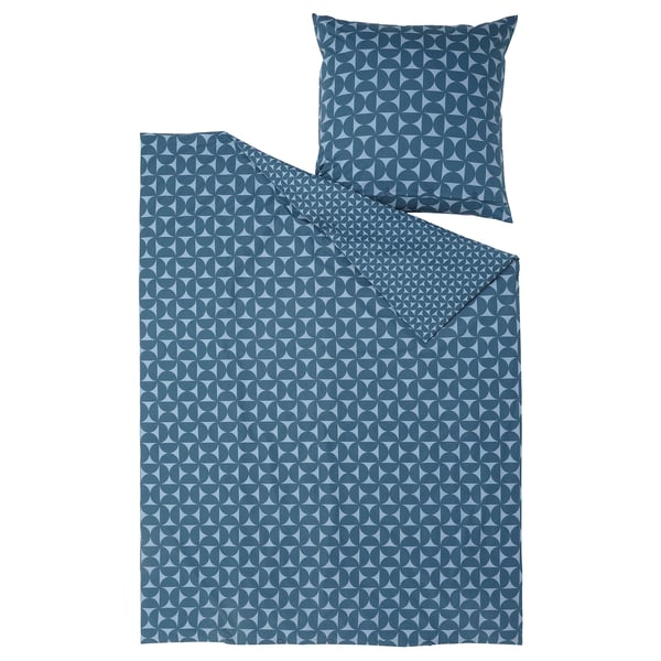 Geometric bedding: dark blue with light blue circles on white. Cotton & viscose mix, duvet closure.