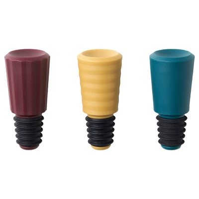 Three colorful silicone and plastic bottle stoppers; red, yellow, blue, ribbed design.