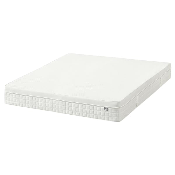 Ikeas white ÅVABERG foam mattress, rectangular with quilted sides, designed for comfort and support.