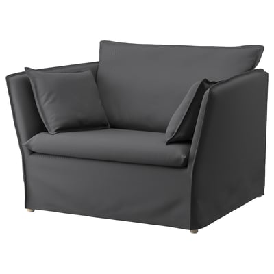 Dark gray chic armchair with sleek design. Comfortable for seating, modern aesthetic.