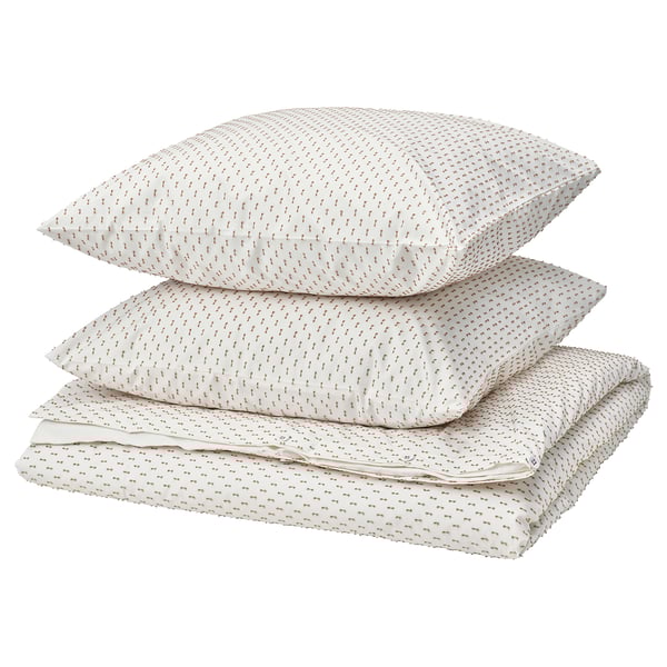 Three white pillows with beige dots, part of the BANDKNIPPE cotton set.