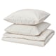Three white pillows with beige dots, part of the BANDKNIPPE cotton set.