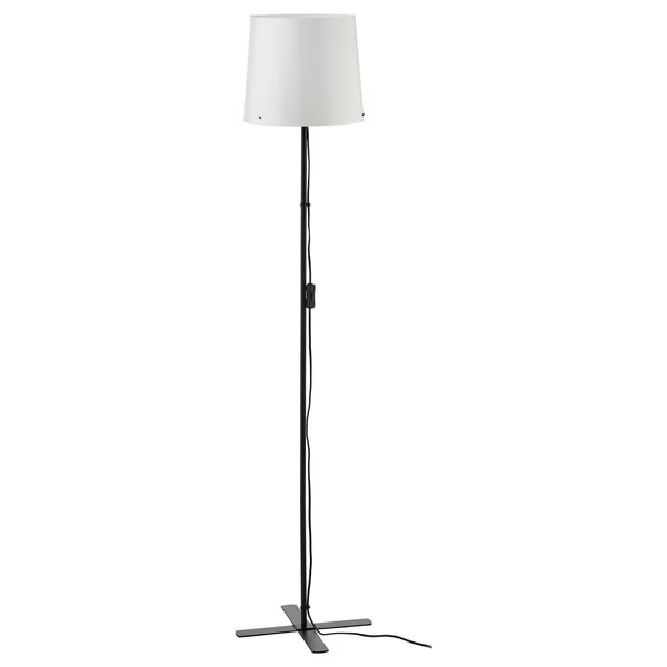 A BARLAST floor lamp in black, featuring a cylindrical white shade and a metallic base. It has a sleek, modern design.