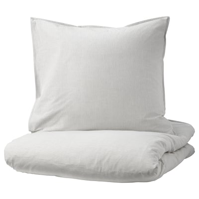 A BERGPALM duvet cover set. It light-colored stripes on soft cotton. The set includes a duvet cover and pillowcases with a vintage, handcrafted look.