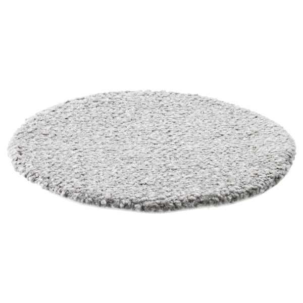 Round, grey chair pad with textured surface and non-slip back. Soft, durable design for comfort.