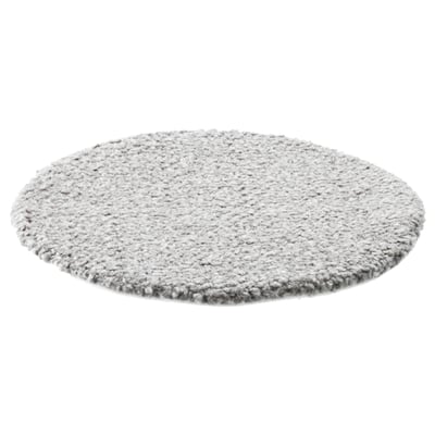 Round, grey chair pad with textured surface and non-slip back. Soft, durable design for comfort.