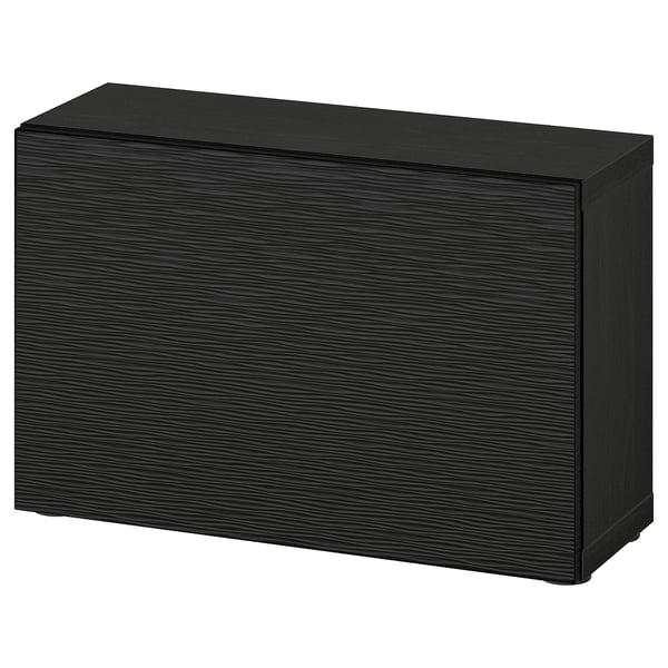 A black ikea BESTÅ storage unit. Its rectangular with a smooth dark wooden texture and flat top.