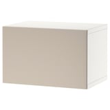 A BESTÅ storage unit in white. Its rectangular, made of wood and particle board, with clean lines and a minimalist design.