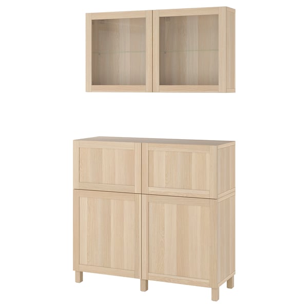 Ikea BESTÅ light oak cabinet set, featuring wall and base units with glass and solid doors.