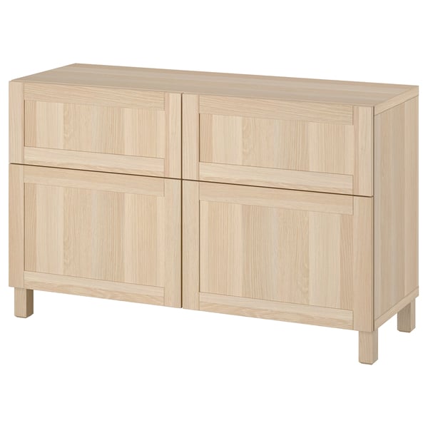 Light wooden sideboard, BESTÅ, light beige, rectangular, four doors, two with shelves, sleek design.