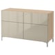 Modern BESTÅ cabinet with light wood top, mirrored doors, metal legs.