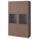 Brown ikea BESTÅ unit: four doors, two glass, adjustable shelves, modern design.