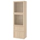 An ikea BESTÅ tall cabinet in white-brown, featuring glass doors at the top and drawers at the bottom, ideal for storage and display.