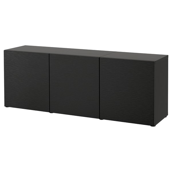 Black BESTÅ storage sideboard with three closed wooden doors.