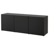 Black BESTÅ storage sideboard with three closed wooden doors.