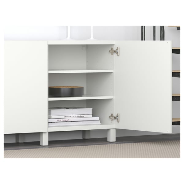 White BESTÅ sideboard with adjustable shelves, soft-closing doors, and horizontal/vertical door adjustment.
