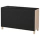 Black and light wood cabinet with 2 doors & glass top.