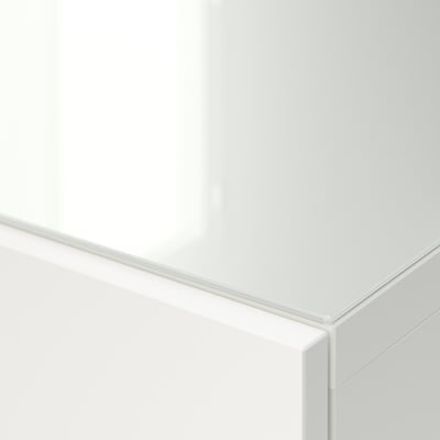 Crisp, clean close-up of BESTÅ temp glass panel; sleek, durable edges.