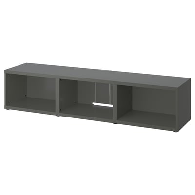 An empty grey BESTÅ tv bench. Its rectangular with three open compartments, designed for storage and concealing cables.