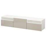 Modern white tv stand with open shelves & center cabinet.