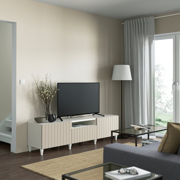 Modern living room with BESTÅ tv bench, flat screen tv, and coffee table.