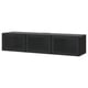 A black BESTÅ tv bench with three glass doors. It has a sleek, modern design and provides ample storage space.