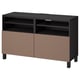 Ikea BESTÅ black-brown tv bench with shelves and brown doors, modern design for cable management.