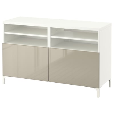 White BESTÅ tv cabinet with two gray doors and open shelves.