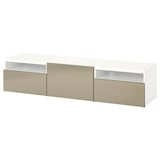 White BESTÅ tv bench with gold handles, rectangular shape, and two open shelves.