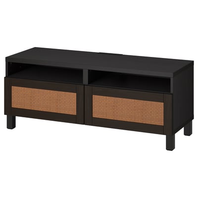 Black BESTÅ tv stand with woven drawers.