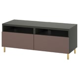 Modern tv stand, black top, mauve drawers, gold legs, open shelf.