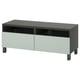 Modern black and white tv stand with two drawers and open shelves; minimalist design, smooth surfaces, adjustable feet.