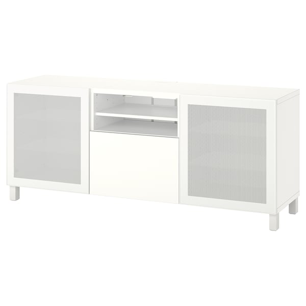 A white BESTÅ tv bench with adjustable shelves, metal mesh doors, and cable management.