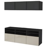 Modern black and gray BESTÅ storage unit with wall-mounted cabinets and tv stand, featuring sleek design and adjustable shelves.
