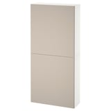 Modern beige BESTÅ wall cabinet with sleek, minimalist design.