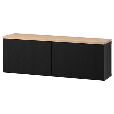 Ikea BESTÅ black & oak shelf unit. Rectangular, wall-mounted, two-door design.