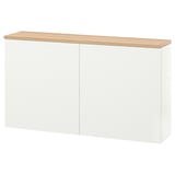 White BESTÅ storage unit with oak top, rectangular shape.
