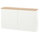 White BESTÅ storage unit with oak top, rectangular shape.