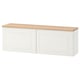 White BESTÅ storage unit with oak top, rectangular design, wall-mountable.