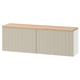 A white ikea BESTÅ storage unit with wooden top, featuring adjustable shelves for customizable home organization.