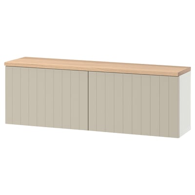 A white ikea BESTÅ storage unit with wooden top, featuring adjustable shelves for customizable home organization.