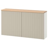 A beige ikea BESTÅ storage unit with oak top and push-open doors.