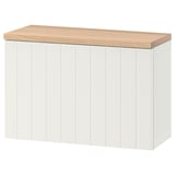 White BESTÅ storage unit with oak top, rectangular shape, vertical grooves.