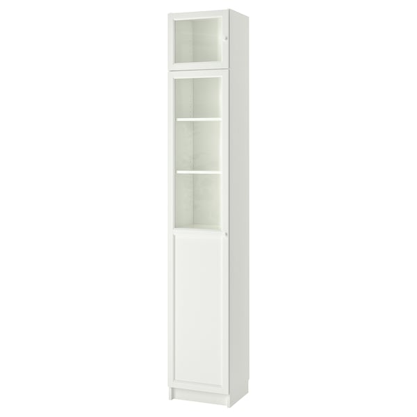 White BILLY bookcase with glass doors, tall rectangular shape, adjustable shelves.