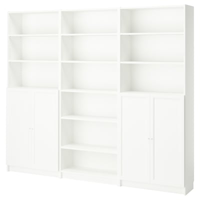 White BILLY bookcase, modern minimalist design, multiple shelves, made of particleboard.