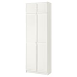 White BILLY bookcase with 4 adjustable shelves behind double doors.
