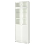 White BILLY bookcase with glass doors, tall and rectangular, has a modern design with adjustable shelves.