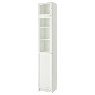 White BILLY bookcase with glass doors, tall rectangular shape, adjustable shelves.