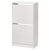 A white BISSA shoe cabinet. This functional piece has two sections for organized storage, with a sleek design suitable for hallways.
